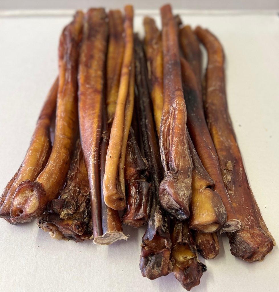 Australian beef bully sticks arranged side by side, showing natural differences in thickness